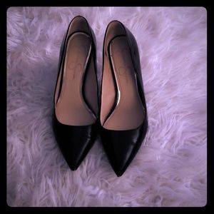Black patent leather pumps